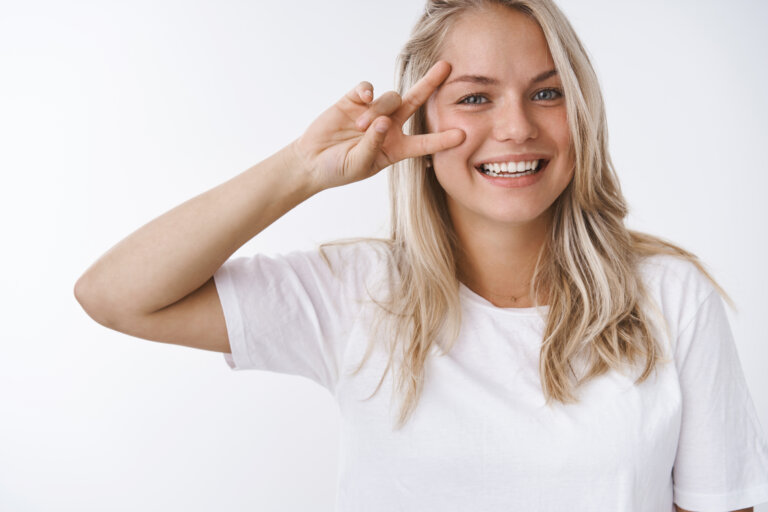 Studio shot of young healthy attractive caucasian woman blond ha