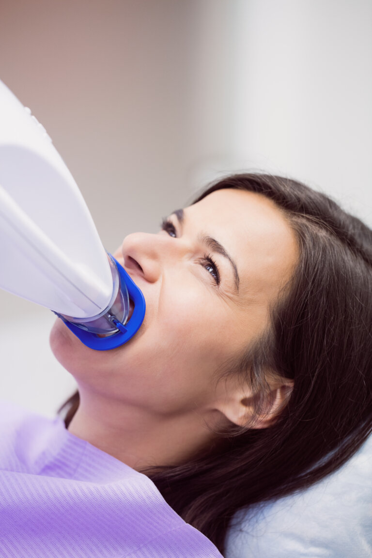 Patient receiving a dental treatment at clinic